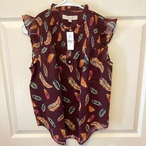 New, tags on, cute smocked blouse with fun feather print